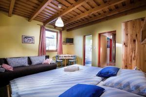 Ένα ή περισσότερα κρεβάτια σε δωμάτιο στο KAPINA sk - Holiday Homes +143 φωτογραφίες