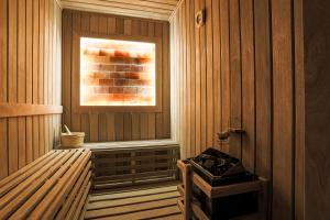 a room with a sauna with a window at Liora Boutique in Riyadh