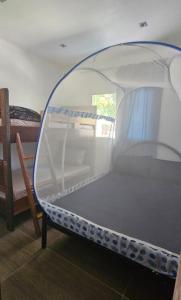 Giường trong phòng chung tại GREEN House