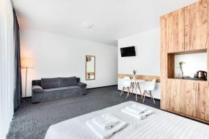 Postel nebo postele na pokoji v ubytování Resort Holiday Home - SPA&Wellness by Noclegi Renters