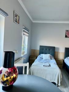 Postel nebo postele na pokoji v ubytování Apartament Adabet