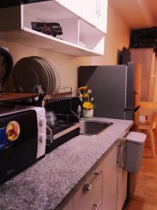 Køkken eller tekøkken på Condo in silang - near nuvali and tagaytay + 1 billede