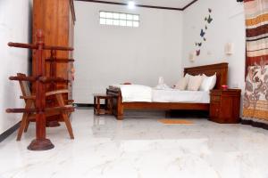 Postel nebo postele na pokoji v ubytování Harmony Village Villa