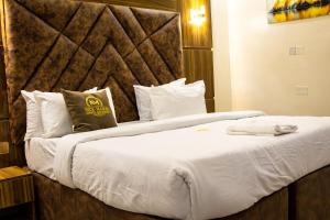 Postel nebo postele na pokoji v ubytování Nice-mason Serene and Suites