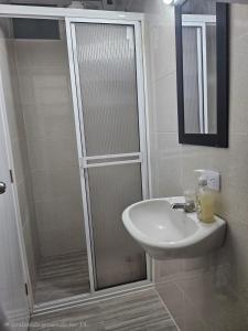 Koupelna v ubytování Livingsleep + 6 fotografií