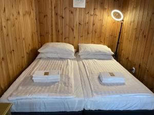 Ένα ή περισσότερα κρεβάτια σε δωμάτιο στο K&B Residence