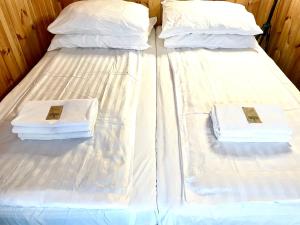 Ένα ή περισσότερα κρεβάτια σε δωμάτιο στο K&B Residence