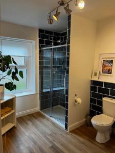 Et badeværelse på Delightful 1 Bedroom Cottage