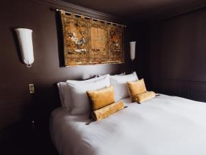 Postel nebo postele na pokoji v ubytování L'Opale Noire