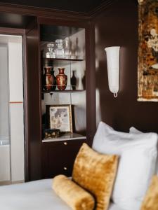 Postel nebo postele na pokoji v ubytování L'Opale Noire