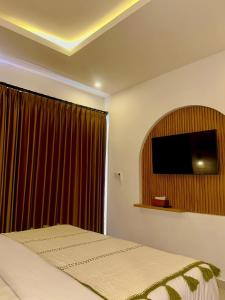 TV a/nebo společenská místnost v ubytování Sundari Guesthouse Pererenan