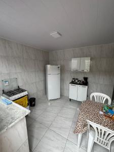 Køkken eller tekøkken på Cantinho no Vale