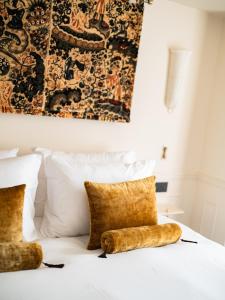 Postel nebo postele na pokoji v ubytování L'Opale Noire