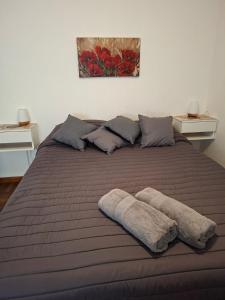 En eller flere senge i et værelse på Los Dias de Viaje