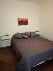 En eller flere senge i et værelse på Los Dias de Viaje + 14 billeder