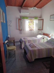 En eller flere senge i et værelse på UNSER TRAUM