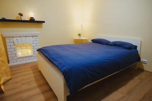 En eller flere senge i et værelse på Big Apartment