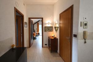 a hallway with a hallway leading to a room at Bellavista in Coazze