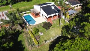an overhead view of a house with a swimming pool at Casa Lago in Santa Ana