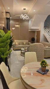 Posezení v ubytování Royal Nest Apartments