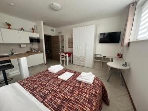 Kuchyň nebo kuchyňský kout v ubytování Alloggio Turistico - I tre Moschettieri - Zona Universitaria e Tribunale Nuovo