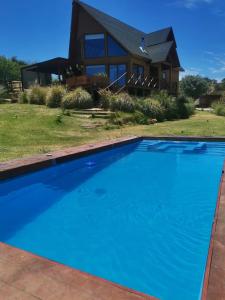 Swimmingpoolen hos eller tæt på Casa Lago Rapel Punta del Sol