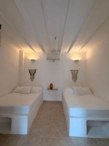 Ένα ή περισσότερα κρεβάτια σε δωμάτιο στο Cabaña Doradal MILOS +9 φωτογραφίες