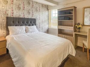 Ένα ή περισσότερα κρεβάτια σε δωμάτιο στο Church Walk Studios & Apartments