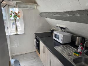 Η κουζίνα ή μικρή κουζίνα στο Church Walk Studios & Apartments