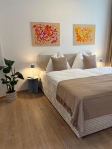 a bedroom with a large bed in a room at Modern apartment in Ferlach in Ferlach