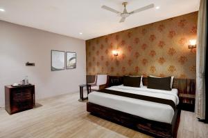 Ένα ή περισσότερα κρεβάτια σε δωμάτιο στο palette - Suncity