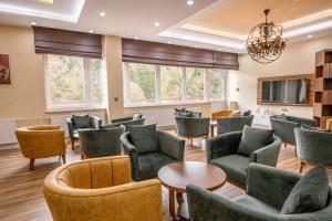 Posezení v ubytování Sunday Schwarzbachtal Hideaway Resort