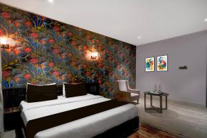 Ένα ή περισσότερα κρεβάτια σε δωμάτιο στο palette - Suncity