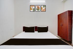 Ένα ή περισσότερα κρεβάτια σε δωμάτιο στο Hotel O by OYO golden blue