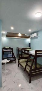 Et opholdsområde på Rey's Pension House - Barkadahan