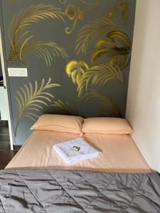 En eller flere senge i et værelse på Prakruthi home stay