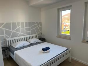 Ένα ή περισσότερα κρεβάτια σε δωμάτιο στο Apartman Ivana