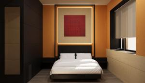 En eller flere senge i et værelse på Palazzo Loreto Hotel Milano