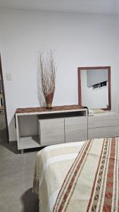 Postel nebo postele na pokoji v ubytování Santa Cruz 1