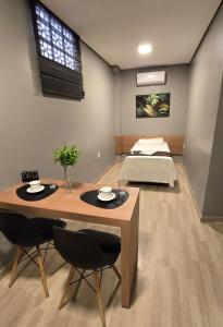 Ένα ή περισσότερα κρεβάτια σε δωμάτιο στο FLATS MELO unimontes