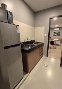 Η κουζίνα ή μικρή κουζίνα στο FLATS MELO unimontes +7 φωτογραφίες