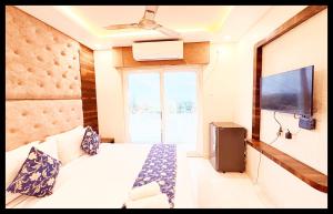 En eller flere senge i et værelse på The View Inn