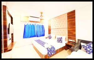 En eller flere senge i et værelse på The View Inn + 2 billeder