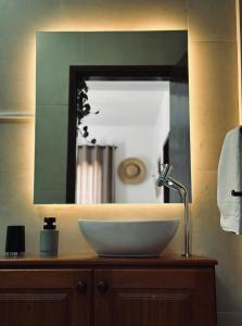 a bathroom with a sink and a mirror at Ar do Mar in Florianópolis +47 photos