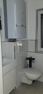 Et badeværelse på Gästehaus Hagen 6 Betten, Parkplatz, Küche, WLAN Easybooking24