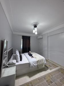 En eller flere senge i et værelse på Alex Panoramic seaview