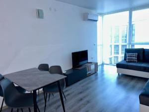 Posezení v ubytování Atlantis Resort & 4 swimming pools & Spa & Апартамент