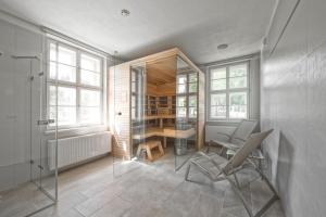 Postel nebo postele na pokoji v ubytování Theresian Apartment