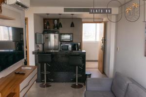 Η κουζίνα ή μικρή κουζίνα στο Paiva Flats by loui 3