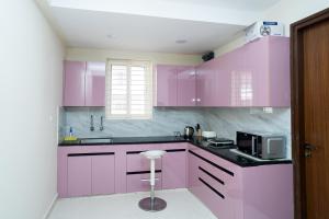 Nhà bếp/bếp nhỏ tại Le Penguin Serviced Apartments